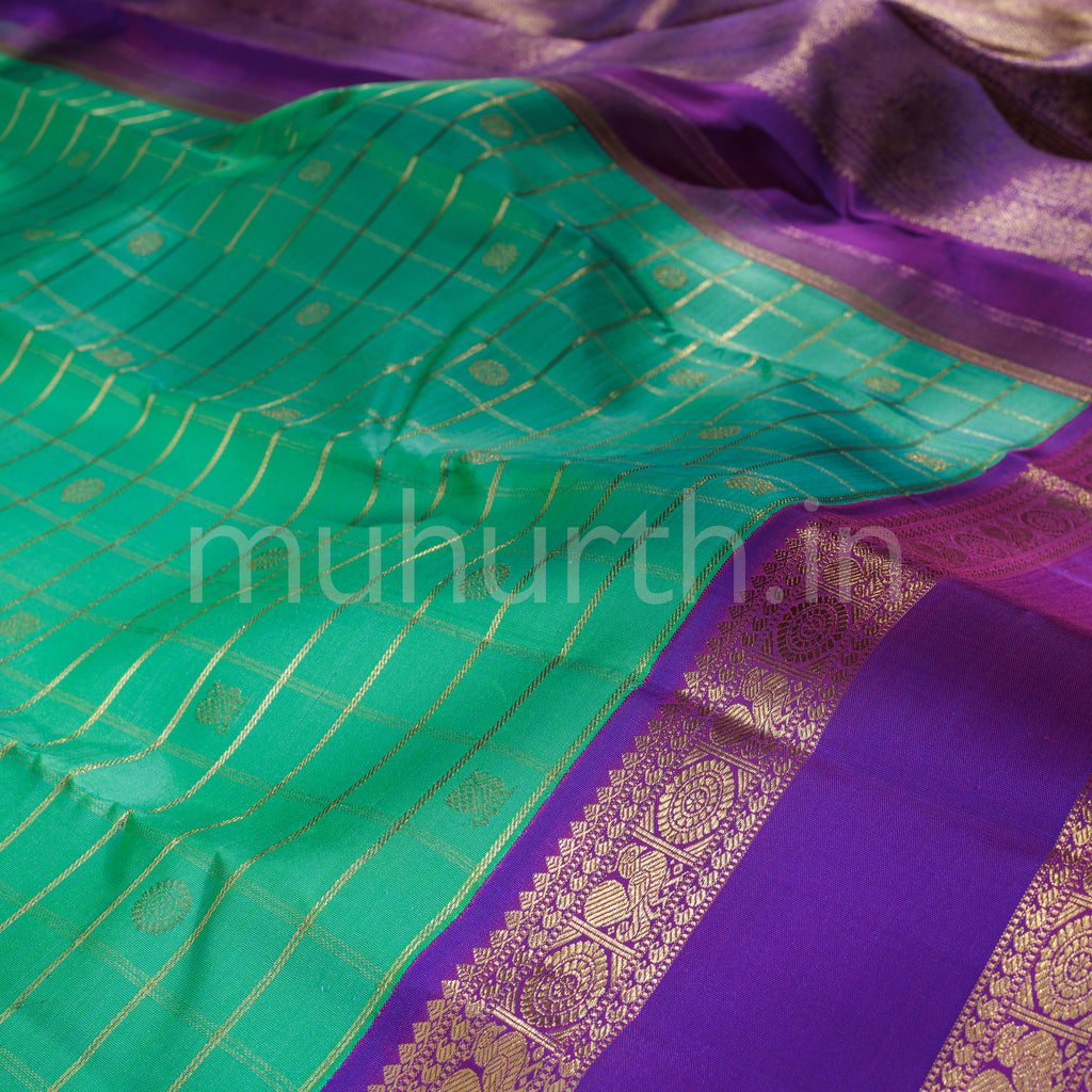Rexona Muthu Kattam Pure Zari Kanjivaram Silk Saree with Magenta