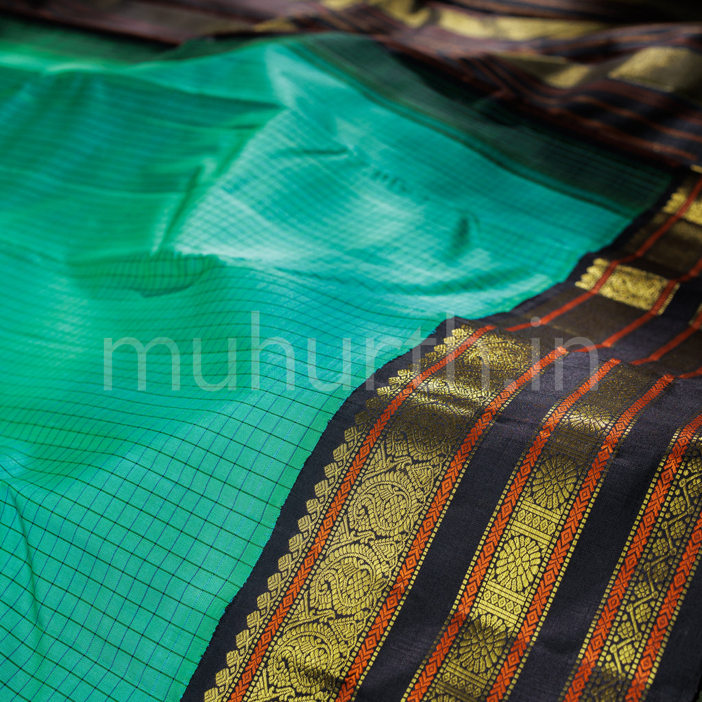 Sea Green Pure Kanjivaram Silk Saree with Black