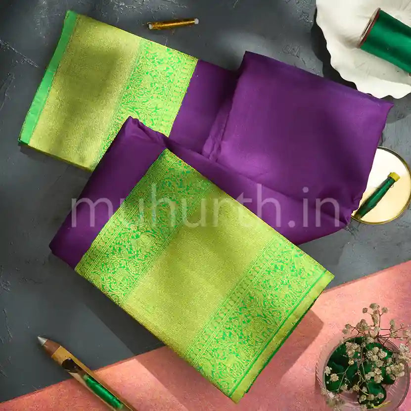 Latest Banarasi SIlk Saree Design in Purple with Green Blouse